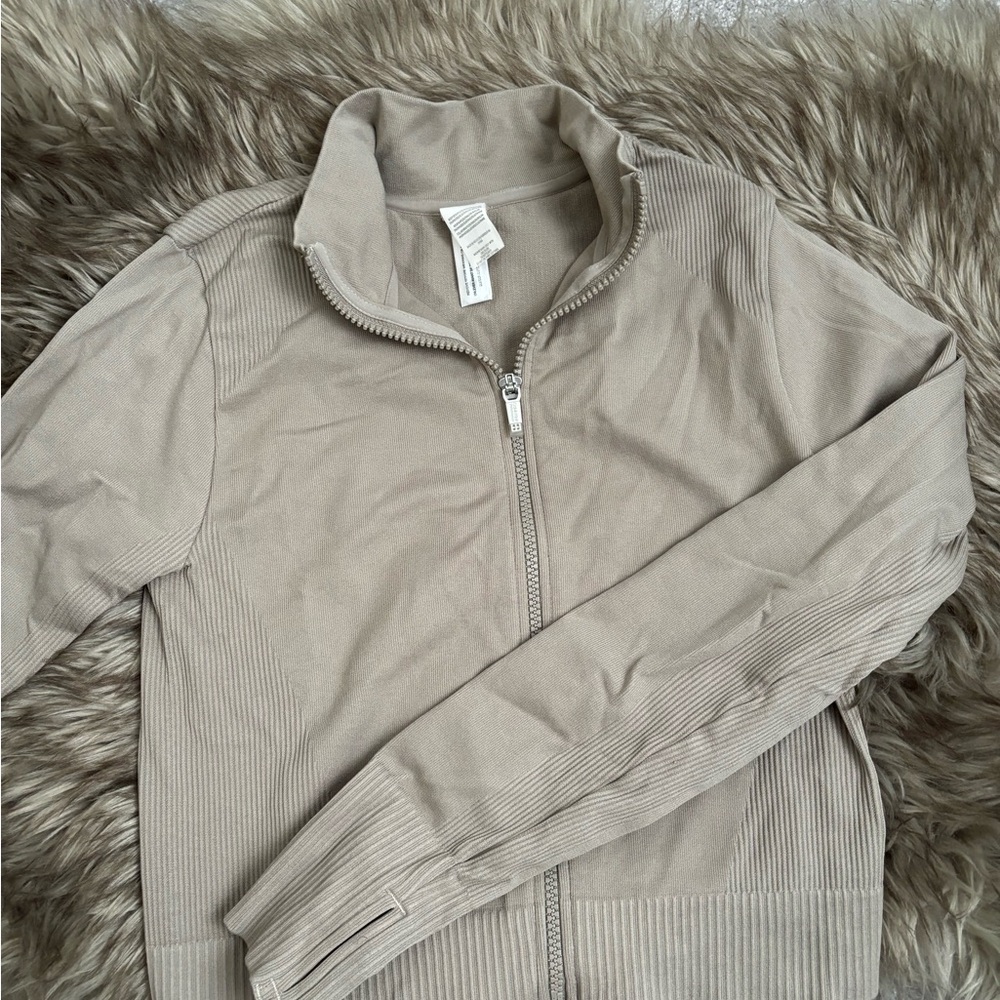 Calvin Klein beige athletic zip up (size S)